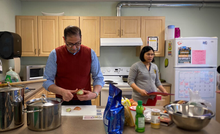 STU President Farooqi collabs with Campus Ministry for a community meal